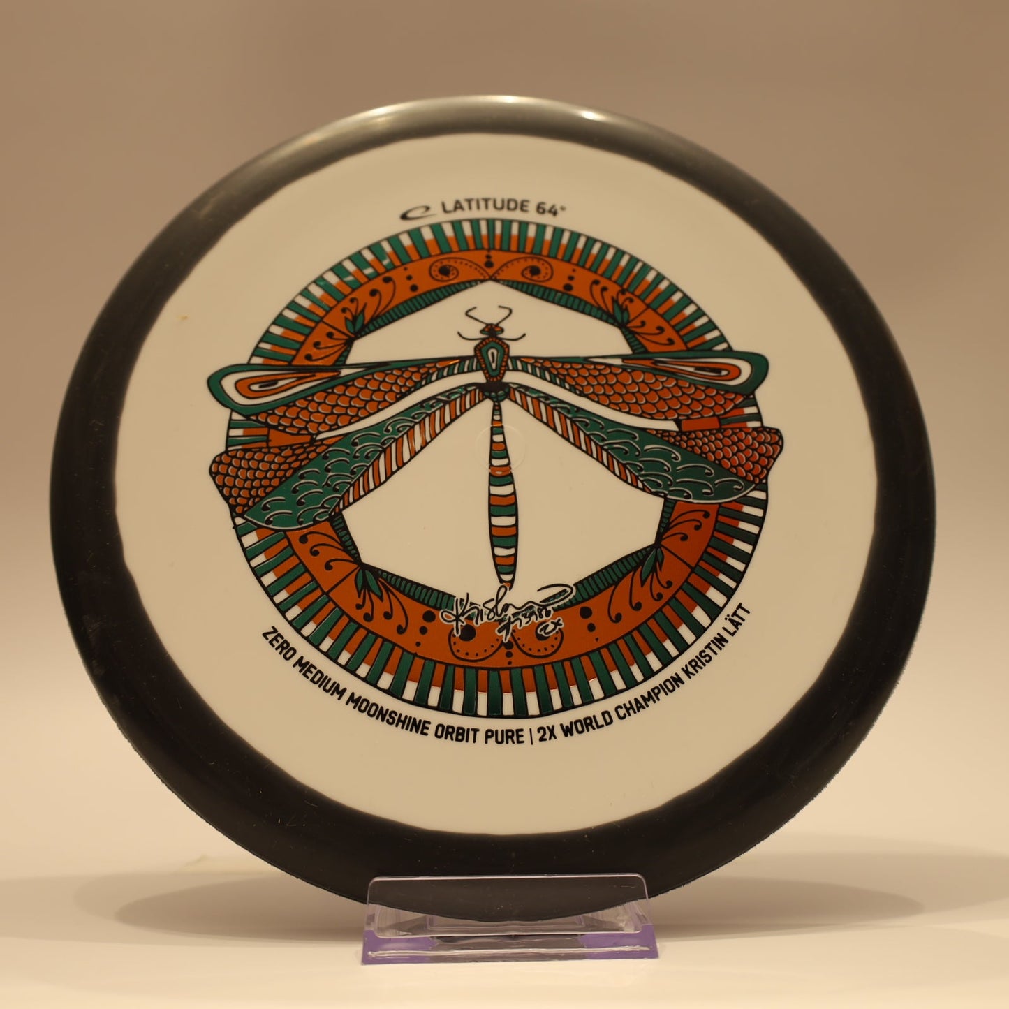 Latitude 64 Pure Zero Medium Moonshine Orbit Kristin Latt Team Series White Black Multi 173g - Laredo Disc Golf Store