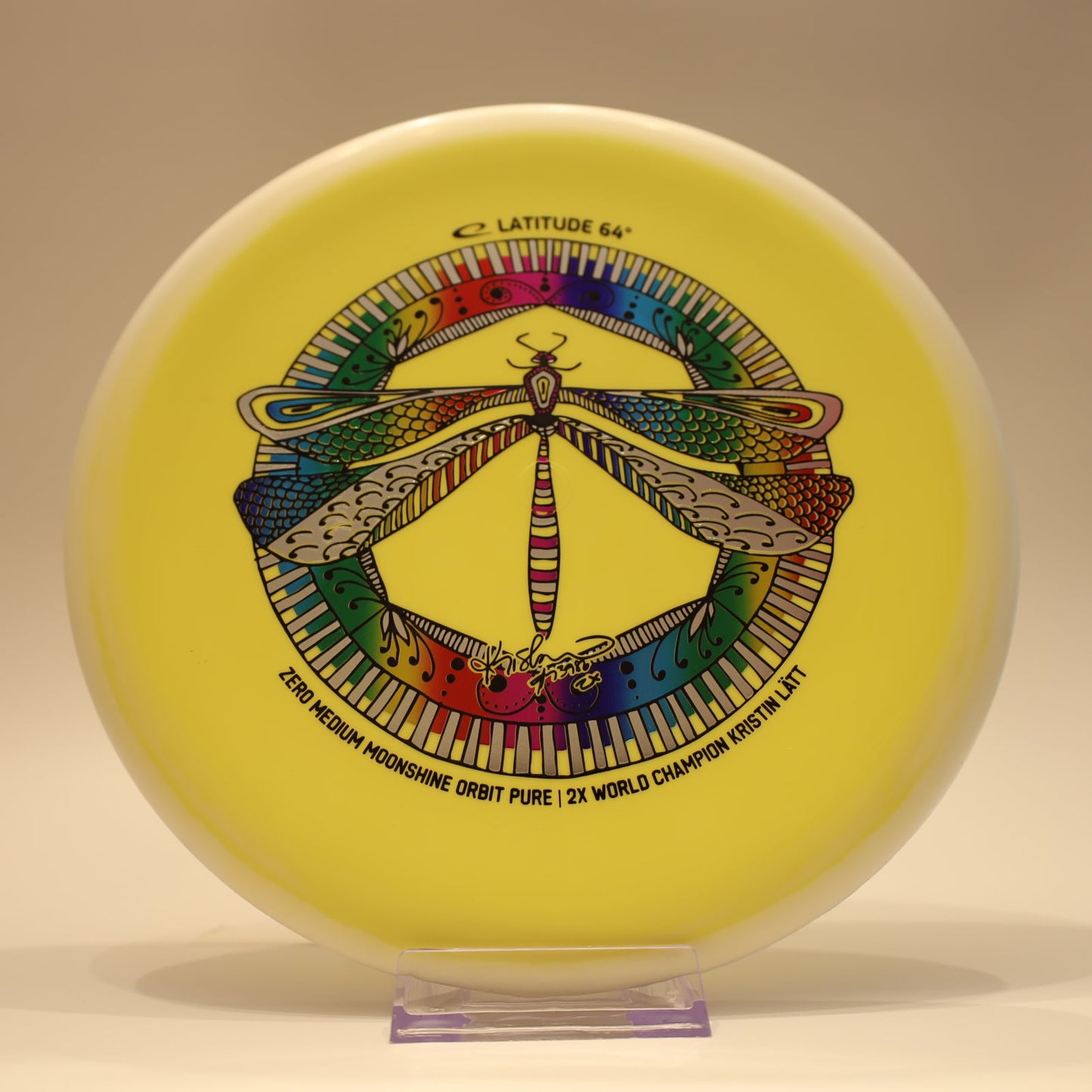 Latitude 64 Pure Zero Medium Moonshine Orbit Kristin Latt Team Series Yellow White Multi 174g - Laredo Disc Golf Store