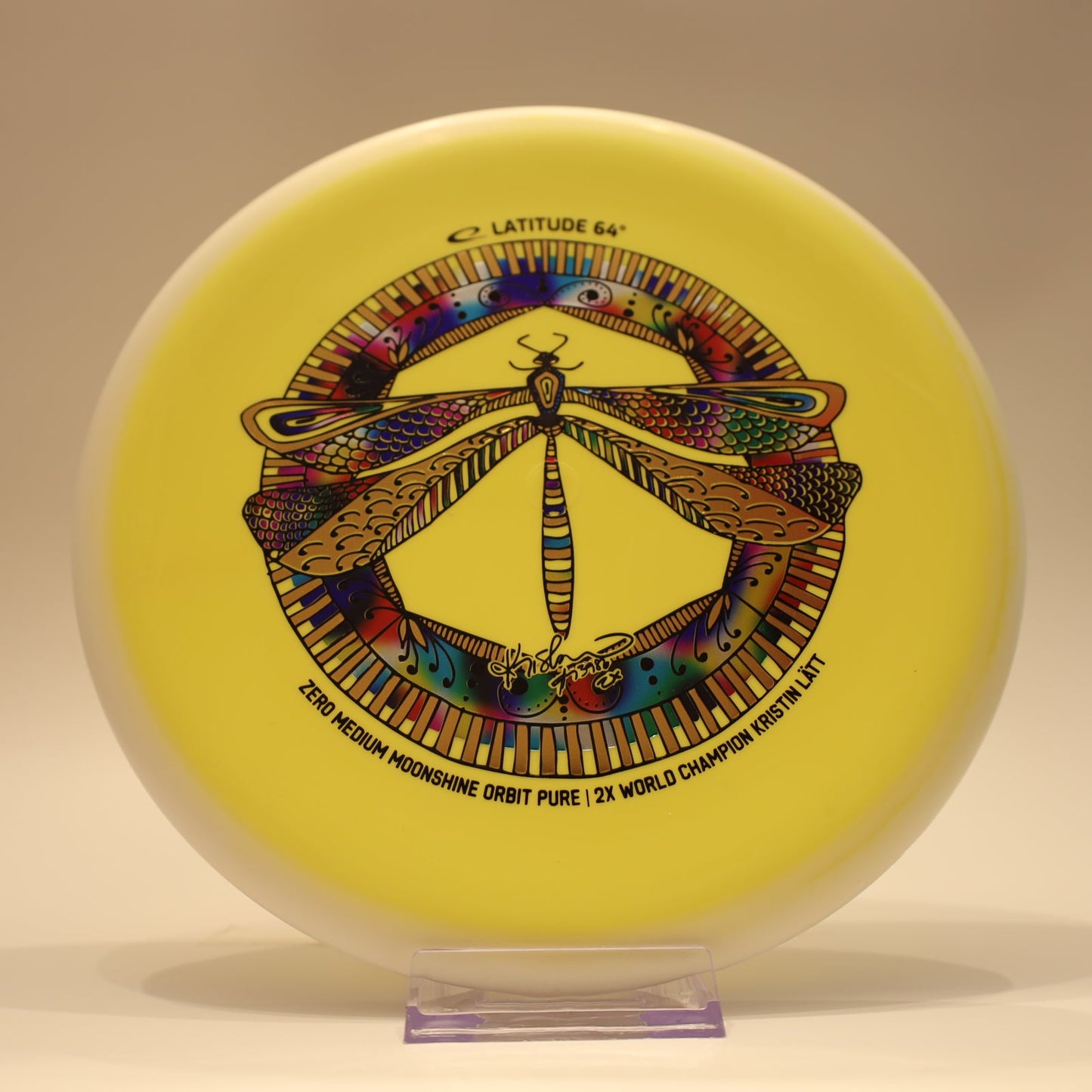 Latitude 64 Pure Zero Medium Moonshine Orbit Kristin Latt Team Series Yellow White Multi 174g - Laredo Disc Golf Store