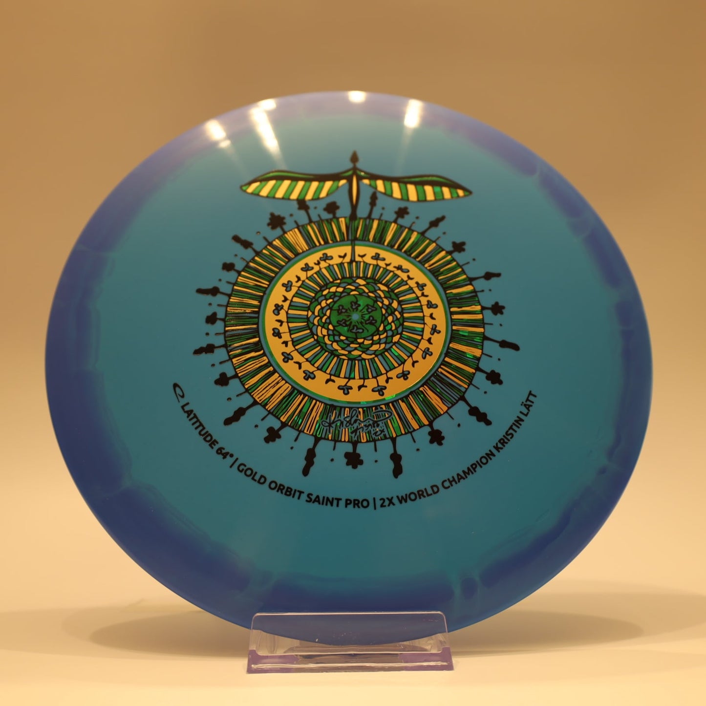 Latitude 64 Saint Pro Gold Orbit Kristin Latt Team Series Baby Blue Blue Multi 173g - Laredo Disc Golf Store