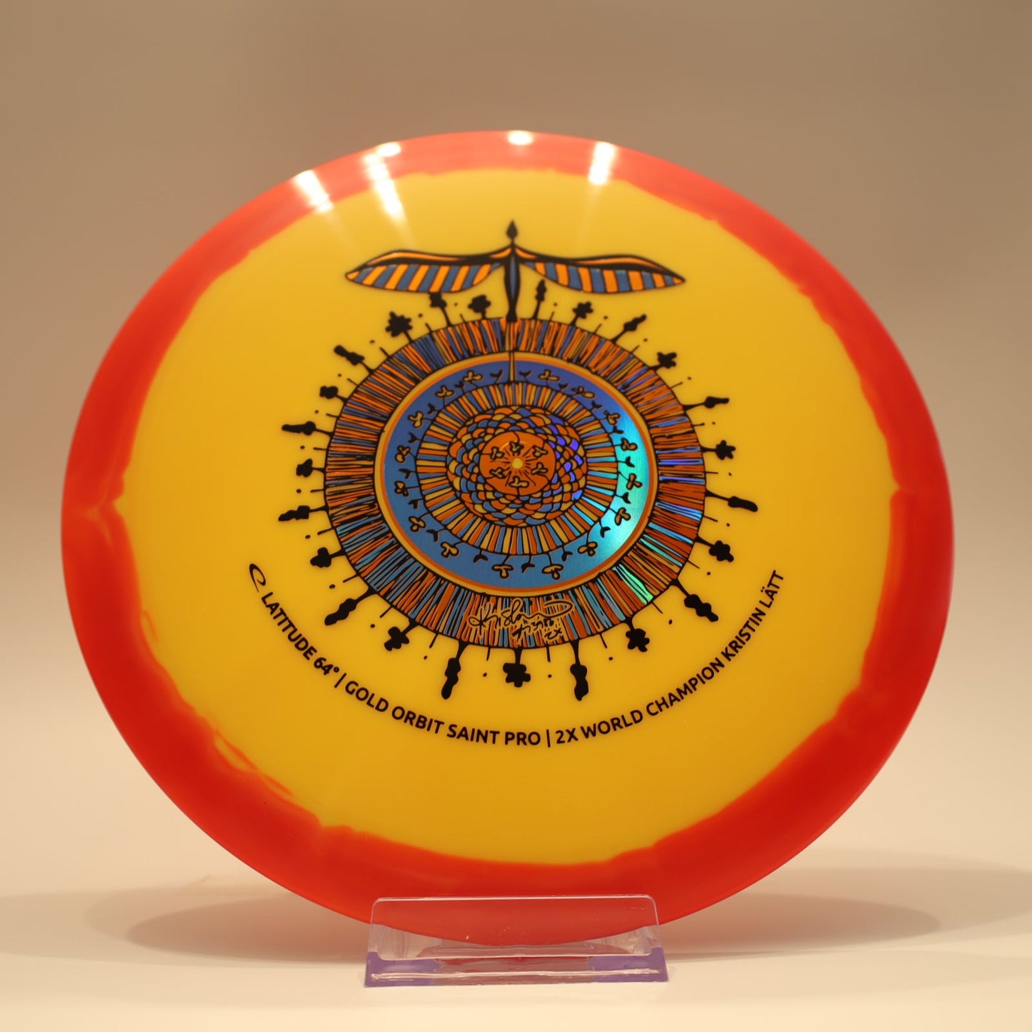 Latitude 64 Saint Pro Gold Orbit Kristin Latt Team Series Yellow Red Orange Multi 173g - Laredo Disc Golf Store