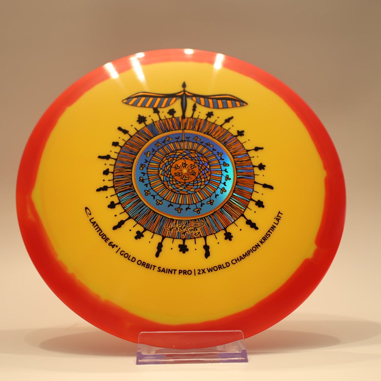 Latitude 64 Saint Pro Gold Orbit Kristin Latt Team Series Yellow Red Orange Multi 174g - Laredo Disc Golf Store