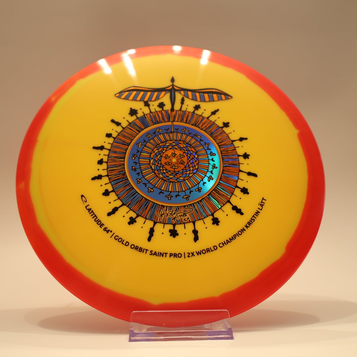 Latitude 64 Saint Pro Gold Orbit Kristin Latt Team Series Yellow Red Orange Multi 176g - Laredo Disc Golf Store